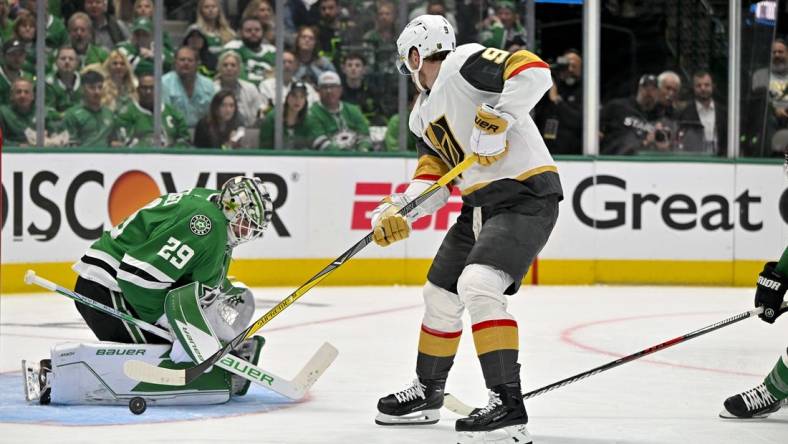 May 25, 2023; Dallas, Texas, USA; Dallas Stars goaltender Jake Oettinger (29) stops a breakaway shot by Vegas Golden Knights center Jack Eichel (9) during the second period in game four of the Western Conference Finals of the 2023 Stanley Cup Playoffs at American Airlines Center. Mandatory Credit: Jerome Miron-USA TODAY Sports