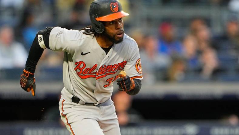 May 23, 2023; Bronx, New York, USA; Baltimore Orioles center fielder Cedric Mullins (31) watches his home run against the New York Yankees during the third inning at Yankee Stadium. Mandatory Credit: Gregory Fisher-USA TODAY Sports