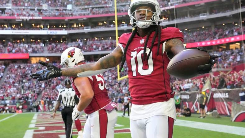 Arizona Cardinals wide receiver DeAndre Hopkins (10) celebrates after a catch against the Seattle Seahawks during the first quarter at State Farm Stadium in Glendale on Nov. 6, 2022.