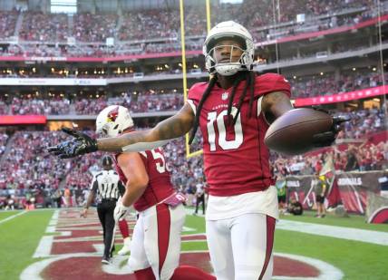 Arizona Cardinals wide receiver DeAndre Hopkins (10) celebrates after a catch against the Seattle Seahawks during the first quarter at State Farm Stadium in Glendale on Nov. 6, 2022.