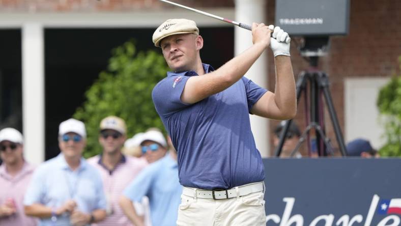 May 26, 2023; Fort Worth, Texas, USA; Harry Hall plays his shot from the 17th tee during the second round of the Charles Schwab Challenge golf tournament. Mandatory Credit: Jim Cowsert-USA TODAY Sports