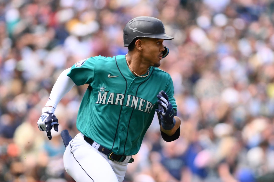 May 27, 2023; Seattle, Washington, USA; Seattle Mariners center fielder Julio Rodriguez (44) runs towards first base after hitting an RBI double against the Pittsburgh Pirates during the second inning at T-Mobile Park. Mandatory Credit: Steven Bisig-USA TODAY Sports
