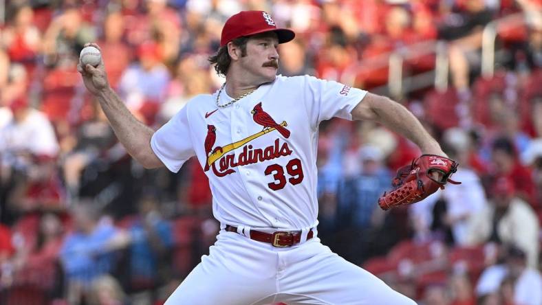 May 30, 2023; St. Louis, Missouri, USA;  St. Louis Cardinals starting pitcher Miles Mikolas (39) pitches against the Kansas City Royals during the first inning at Busch Stadium. Mandatory Credit: Jeff Curry-USA TODAY Sports