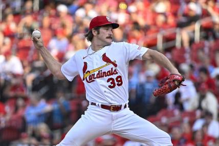 May 30, 2023; St. Louis, Missouri, USA;  St. Louis Cardinals starting pitcher Miles Mikolas (39) pitches against the Kansas City Royals during the first inning at Busch Stadium. Mandatory Credit: Jeff Curry-USA TODAY Sports