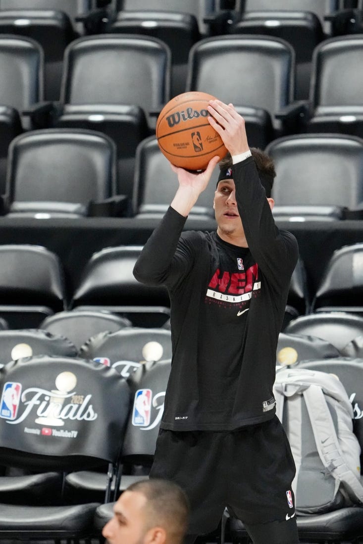 May 31, 2023; Denver, CO, USA; Miami Heat guard Tyler Herro (14) shoots the ball during a practice session on media day before the 2023 NBA Finals at Ball Arena. Mandatory Credit: Kyle Terada-USA TODAY Sports
