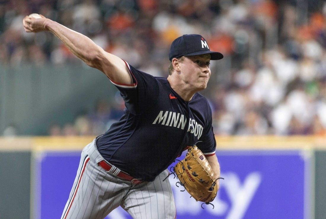 Minnesota Twins' Ryan Jeffers is hit by a pitch thrown by Houston