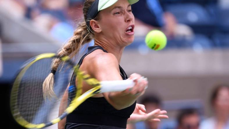 Caroline Wozniacki of Denmark hits to Bianca Andreescu of Canada the third round on day six of the 2019 U.S. Open tennis tournament at USTA Billie Jean King National Tennis Center. Mandatory Credit: Robert Deutsch-USA TODAY Sports