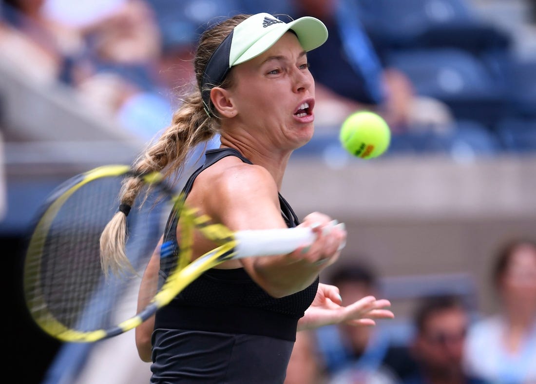 Caroline Wozniacki of Denmark hits to Bianca Andreescu of Canada the third round on day six of the 2019 U.S. Open tennis tournament at USTA Billie Jean King National Tennis Center. Mandatory Credit: Robert Deutsch-USA TODAY Sports