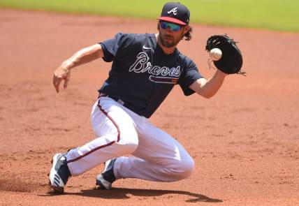 Jul 16, 2020; Atlanta, Georgia, United States;  Atlanta Braves second baseman Charlie Culberson (8) fields a ground ball during an intrasquad game in their summer workout session at Truist Park. Mandatory Credit: John David Mercer-USA TODAY Sports