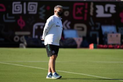 Jul 2, 2021; Los Angeles, CA, USA; Mexico national team coach Tata Martino aka Gerardo Martino wears a face mask at training session at the Los Angeles Memorial Coliusem prior to a MexTour match against Nigeria. Mandatory Credit: Kirby Lee-USA TODAY Sports