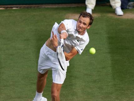 Jul 3, 2021; London, United Kingdom;  
Daniil Medvedev (RUS) plays Marin Cilic (CRO) on No 1 court in the men   s third round at All England Lawn Tennis and Croquet Club. Mandatory Credit: Peter van den Berg-USA TODAY Sports