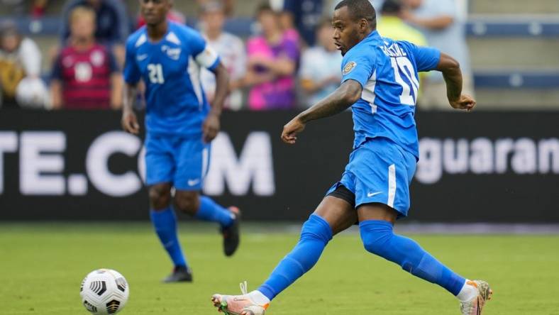 Jul 11, 2021; Kansas City, Kansas, USA; Martinique forward Kevin Fortune (10) passes the ball against Canada in the first half during a CONCACAF Gold Cup group stage soccer match at Children's Mercy Park. Mandatory Credit: Jay Biggerstaff-USA TODAY Sports