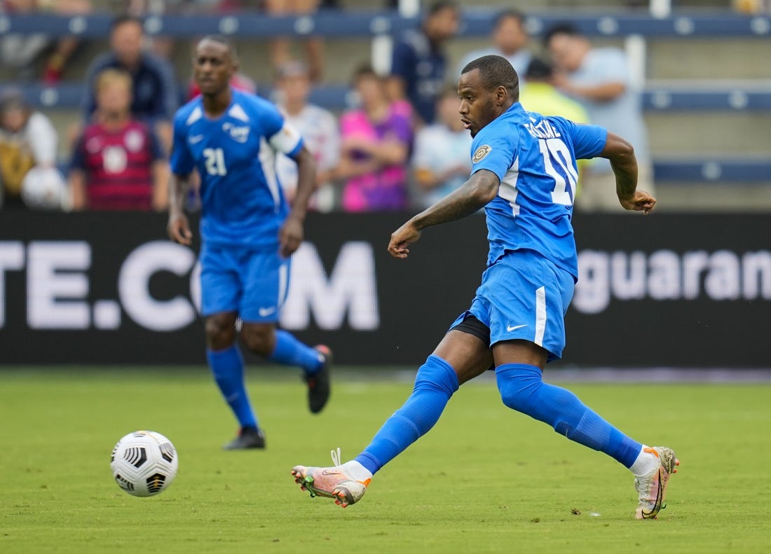 Jul 11, 2021; Kansas City, Kansas, USA; Martinique forward Kevin Fortune (10) passes the ball against Canada in the first half during a CONCACAF Gold Cup group stage soccer match at Children's Mercy Park. Mandatory Credit: Jay Biggerstaff-USA TODAY Sports