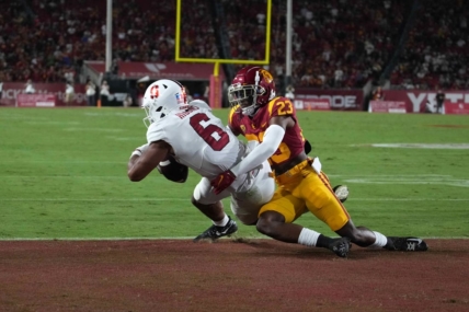 Sep 11, 2021; Los Angeles, California, USA; Stanford Cardinal wide receiver Elijah Higgins (6) catches a 3-yard touchdown pass as Southern California Trojans cornerback Joshua Jackson Jr. (23) defends in the second quarter  at United Airlines Field at Los Angeles Memorial Coliseum. Mandatory Credit: Kirby Lee-USA TODAY Sports
