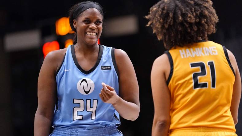 Jan 28, 2022; Las Vegas, Nevada, USA; Team Sims center Kalani Brown (24) talks with Team Mitchell forward Tianna Hawkins (21) during the third quarter at Athletes Unlimited Arena. Mandatory Credit: Lucas Peltier-USA TODAY Sports