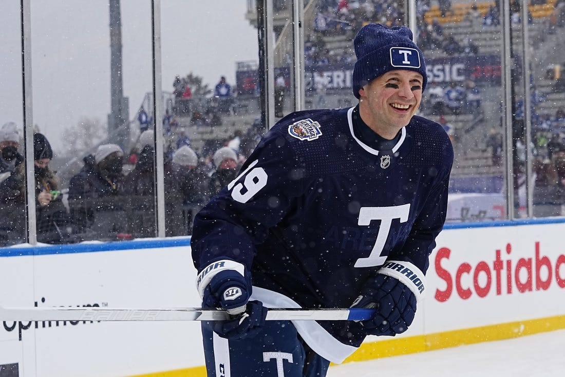 Mar 13, 2022; Hamilton, Ontario, CAN; Toronto Maple Leafs forward Jason Spezza (19) warms up against the Buffalo Sabres in the 2022 Heritage Classic ice hockey game at Tim Hortons Field. Mandatory Credit: John E. Sokolowski-USA TODAY Sports