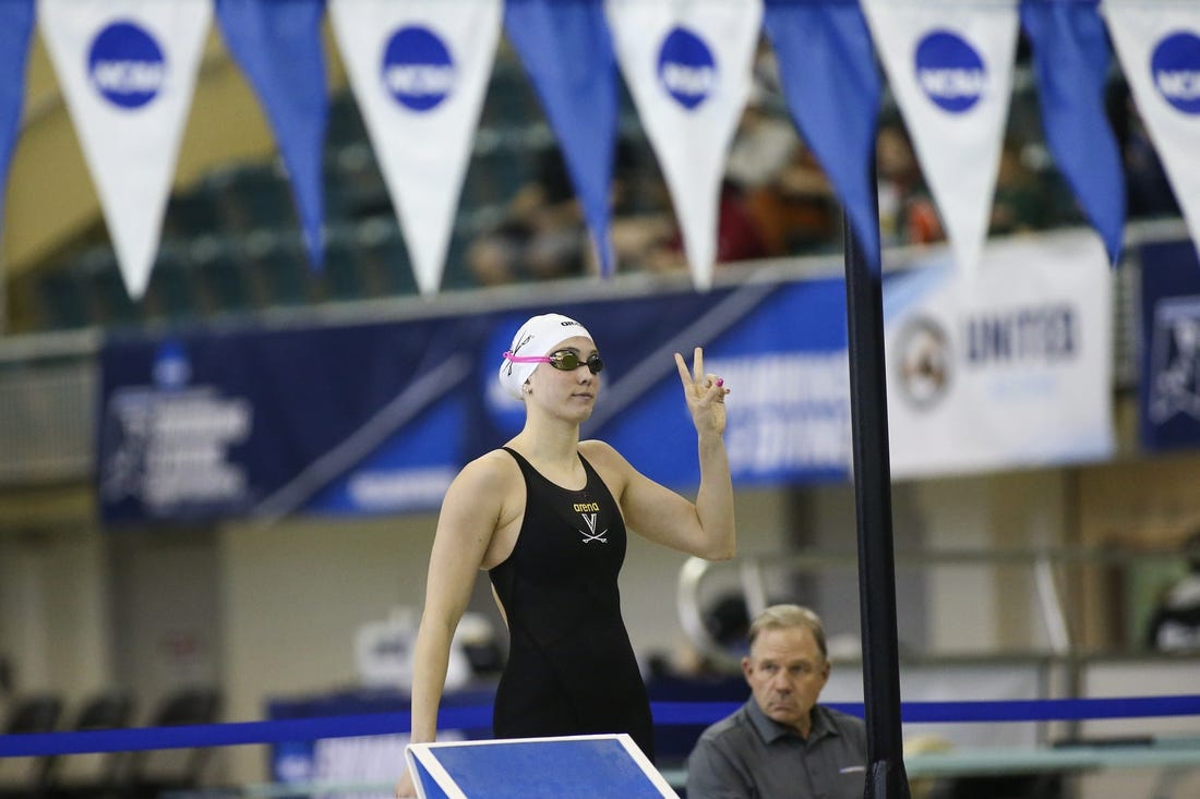 Mar 18, 2022; Atlanta, Georgia, USA; Virginia Cavaliers swimmer Emma Weyant is introduced before the 400 IM at the NCAA Swimming & Diving Championships at Georgia Tech. Mandatory Credit: Brett Davis-USA TODAY Sports