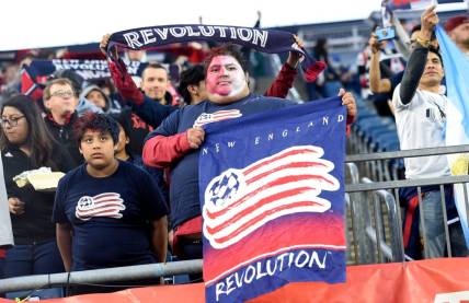 Apr 30, 2022; Foxborough, Massachusetts, USA; A New England Revolution fan holds a banner before a match against Inter Miami at Gillette Stadium. Mandatory Credit: Bob DeChiara-USA TODAY Sports