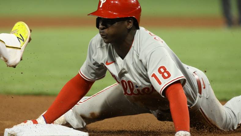 Jul 30, 2022; Pittsburgh, Pennsylvania, USA; Philadelphia Phillies shortstop Didi Gregorius (18) is safe at third base on a fields choice play during the tenth inning at PNC Park. The Phillies won 2-1 in 10 innings. Mandatory Credit: Charles LeClaire-USA TODAY Sports