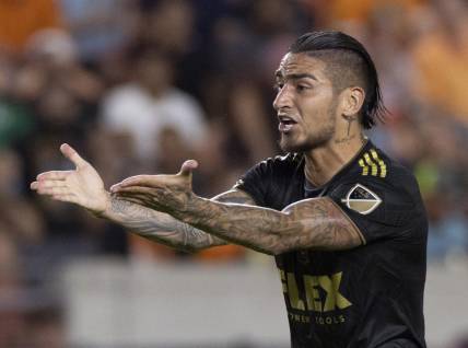 Aug 31, 2022; Houston, Texas, USA; Los Angeles FC forward Cristian Arango (9) reacts toward referee Mathew Conger (not pictured) in the first half against Houston Dynamo FC at PNC Stadium. Mandatory Credit: Thomas Shea-USA TODAY Sports