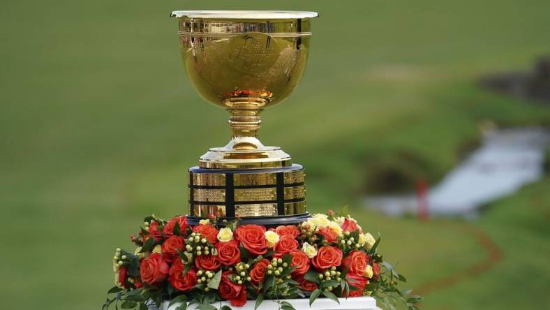 Sep 25, 2022; Charlotte, North Carolina, USA; The trophy on the 15th green for the trophy ceremony during the singles match play of the Presidents Cup golf tournament at Quail Hollow Club. Mandatory Credit: Peter Casey-USA TODAY Sports