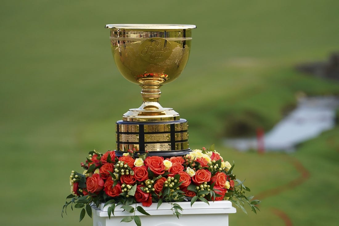 Sep 25, 2022; Charlotte, North Carolina, USA; The trophy on the 15th green for the trophy ceremony during the singles match play of the Presidents Cup golf tournament at Quail Hollow Club. Mandatory Credit: Peter Casey-USA TODAY Sports