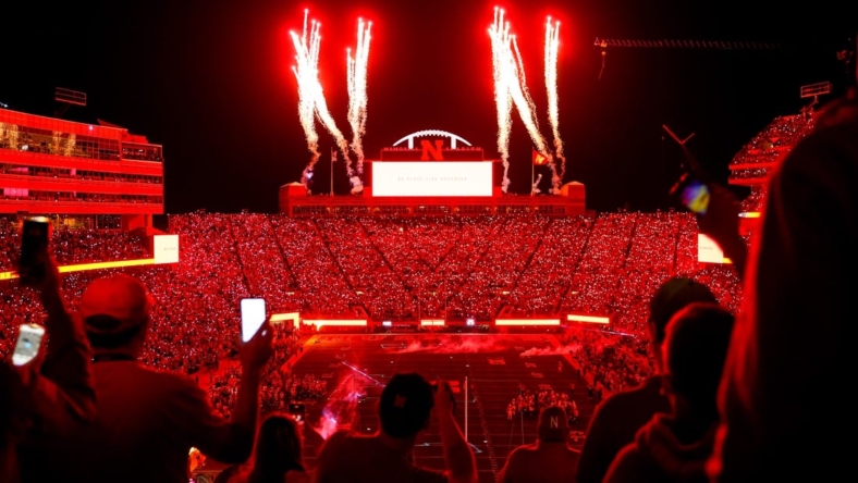 Oct 1, 2022; Lincoln, Nebraska, USA; Fans participate in a light show at the end of the third quarter between the Nebraska Cornhuskers and the Indiana Hoosiers at Memorial Stadium. Mandatory Credit: Dylan Widger-USA TODAY Sports
