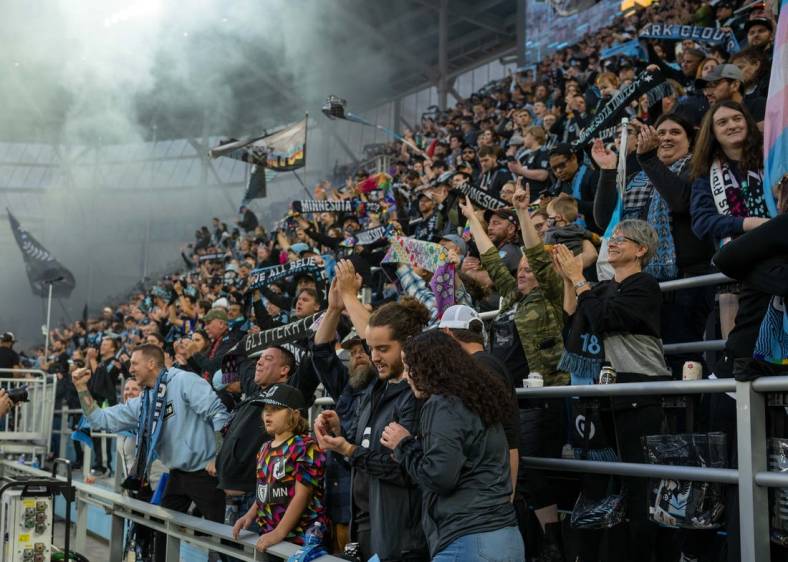 Oct 9, 2022; Saint Paul, Minnesota, USA; Fans celebrate a win and a trip to the playoffs as the Minnesota United defeat the Vancouver Whitecaps 2-0 at Allianz Field. Mandatory Credit: Matt Blewett-USA TODAY Sports