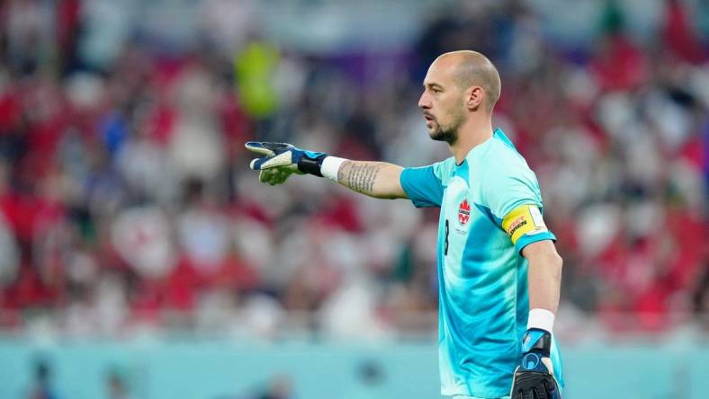 Dec 1, 2022; Doha, Qatar; Canada goalkeeper Milan Borjan (18) gestures against Morocco during the second half of a group stage match during the 2022 World Cup at Al Thumama Stadium. Mandatory Credit: Danielle Parhizkaran-USA TODAY Sports