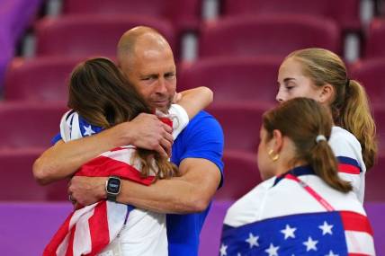 Dec 3, 2022; Al Rayyan, Qatar; United States of America manager Gregg Berhalter with family after losing a round of sixteen match against the Netherlands in the 2022 FIFA World Cup at Khalifa International Stadium. Mandatory Credit: Danielle Parhizkaran-USA TODAY Sports