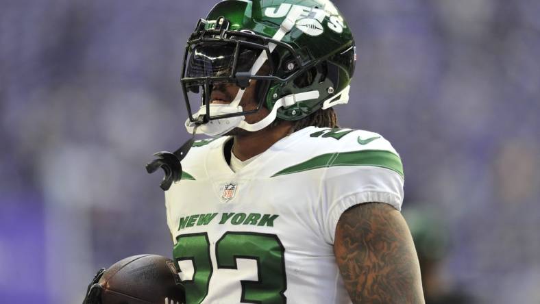 Dec 4, 2022; Minneapolis, Minnesota, USA; New York Jets running back James Robinson (23) warms up before the game against the Minnesota Vikings at U.S. Bank Stadium. Mandatory Credit: Jeffrey Becker-USA TODAY Sports