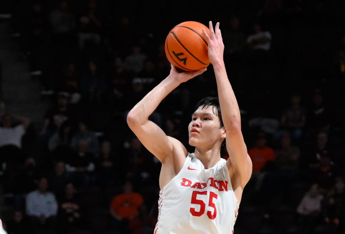 Dec 7, 2022; Blacksburg, Virginia, USA; Dayton Flyers forward Mike Sharavjamts (55) shoots during game against the Virginia Tech Hokies at Cassell Coliseum. Mandatory Credit: Lee Luther Jr.-USA TODAY Sports