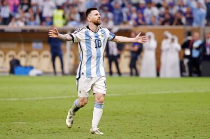 Dec 18, 2022; Lusail, Qatar; Argentina forward Lionel Messi (10) reacts after making his shot during a penalty shootout in the 2022 World Cup final at Lusail Stadium. Mandatory Credit: Yukihito Taguchi-USA TODAY Sports