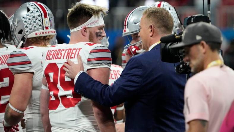 Dec 31, 2022; Atlanta, Georgia, USA; ESPN announcer Kirk Herbstreit talks to his son, Ohio State Buckeyes tight end Zak Herbstreit (89), prior to the Peach Bowl in the College Football Playoff semifinal at Mercedes-Benz Stadium. Mandatory Credit: Adam Cairns-The Columbus Dispatch

Ncaa Football Peach Bowl Ohio State At Georgia