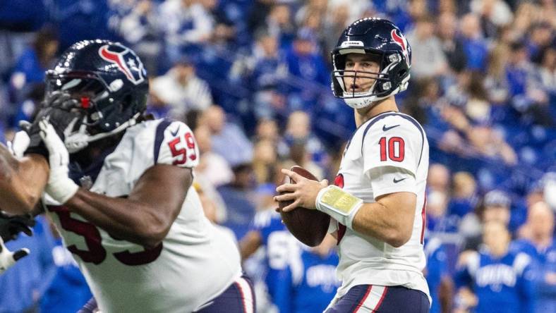 Jan 8, 2023; Indianapolis, Indiana, USA; Houston Texans quarterback Davis Mills (10) drops back to pass the ball in the first quarter against the Indianapolis Colts at Lucas Oil Stadium. Mandatory Credit: Trevor Ruszkowski-USA TODAY Sports