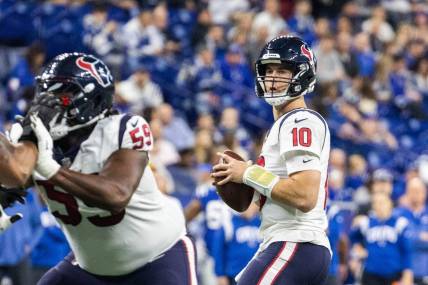 Jan 8, 2023; Indianapolis, Indiana, USA; Houston Texans quarterback Davis Mills (10) drops back to pass the ball in the first quarter against the Indianapolis Colts at Lucas Oil Stadium. Mandatory Credit: Trevor Ruszkowski-USA TODAY Sports