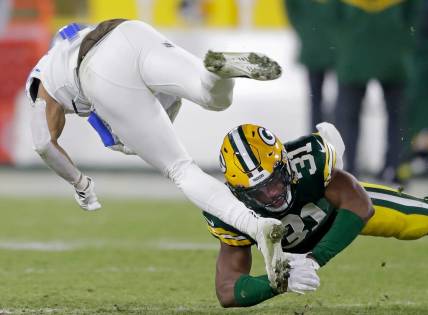 Green Bay Packers safety Adrian Amos (31) upends Detroit Lions wide receiver Kalif Raymond (11) during their football game on Sunday, January, 8, 2022 at Lambeau Field in Green Bay, Wis. Wm. Glasheen USA TODAY NETWORK-Wisconsin

Apc Packers Vs Lions 5226 010823 Wag