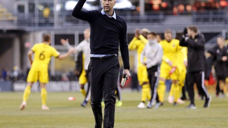 Columbus Crew SC head coach Gregg Berhalter pumps his fist as he thanks fans following the first leg of the MLS Cup Eastern Conference semifinal at Mapfre Stadium in Columbus on Nov. 4, 2018. The Crew will take a 1-0 lead to Red Bull Arena on Nov. 11 for the second leg. [Adam Cairns/Dispatch]

Columbus Crew Sc New York Red Bulls