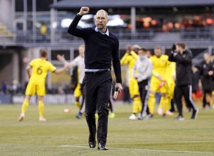 Columbus Crew SC head coach Gregg Berhalter pumps his fist as he thanks fans following the first leg of the MLS Cup Eastern Conference semifinal at Mapfre Stadium in Columbus on Nov. 4, 2018. The Crew will take a 1-0 lead to Red Bull Arena on Nov. 11 for the second leg. [Adam Cairns/Dispatch]

Columbus Crew Sc New York Red Bulls
