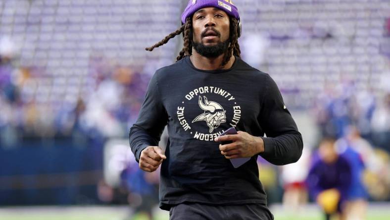 Jan 15, 2023; Minneapolis, Minnesota, USA; Minnesota Vikings running back Dalvin Cook (4) during warmups before a wild card game against the New York Giants at U.S. Bank Stadium. Mandatory Credit: Matt Krohn-USA TODAY Sports