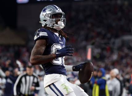 Jan 16, 2023; Tampa, Florida, USA; Dallas Cowboys wide receiver CeeDee Lamb (88) makes a touchdown catch against the Tampa Bay Buccaneers in the second half during the wild card game at Raymond James Stadium. Mandatory Credit: Kim Klement-USA TODAY Sports