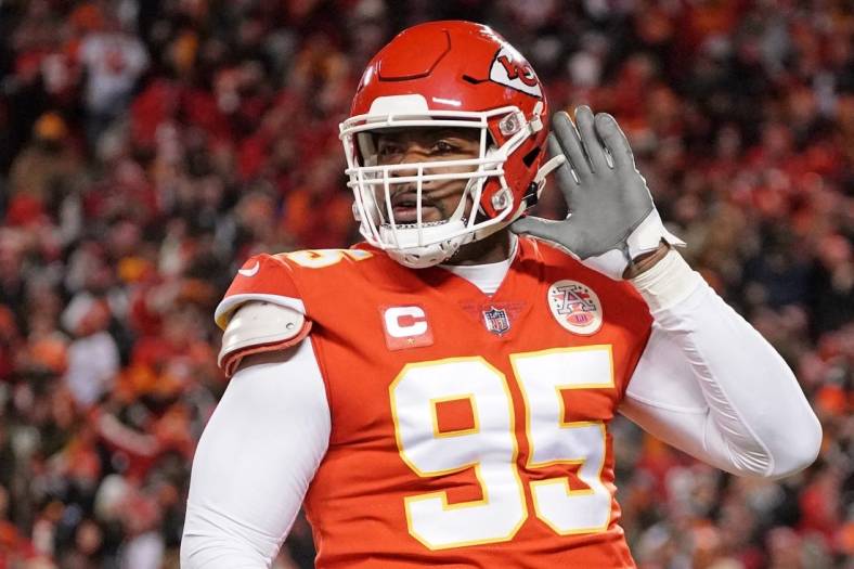 Jan 29, 2023; Kansas City, Missouri, USA; Kansas City Chiefs defensive tackle Chris Jones (95) celebrates after a sack against the Cincinnati Bengals during the first quarter of the AFC Championship game at GEHA Field at Arrowhead Stadium. Mandatory Credit: Denny Medley-USA TODAY Sports