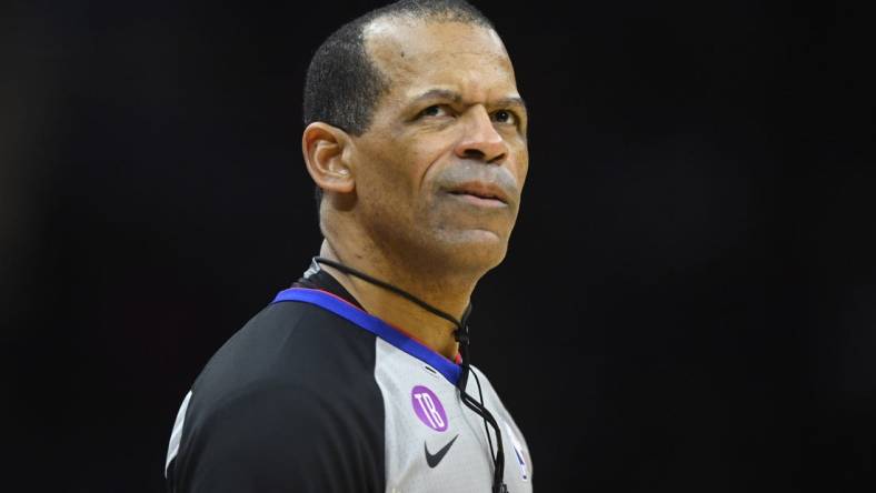 Feb 8, 2023; Cleveland, Ohio, USA; NBA referee Eric Lewis (42) stands on the court in the third quarter of a game between the Cleveland Cavaliers and the Detroit Pistons at Rocket Mortgage FieldHouse. Mandatory Credit: David Richard-USA TODAY Sports