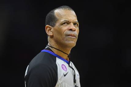 Feb 8, 2023; Cleveland, Ohio, USA; NBA referee Eric Lewis (42) stands on the court in the third quarter of a game between the Cleveland Cavaliers and the Detroit Pistons at Rocket Mortgage FieldHouse. Mandatory Credit: David Richard-USA TODAY Sports