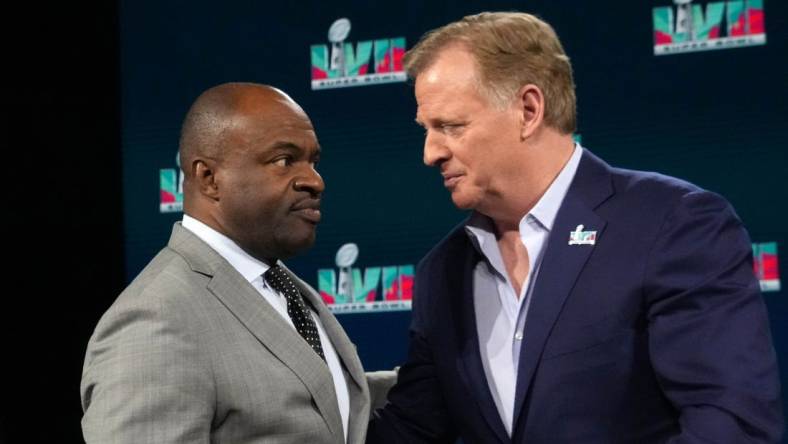 Feb 8, 2023; Phoenix, AZ, USA; NFL commissioner Roger Goodell (right) and NFLPA executive director DeMaurice Smith interact at press conference at Phoenix Convention Center. Mandatory Credit: Kirby Lee-USA TODAY Sports