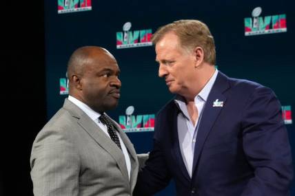 Feb 8, 2023; Phoenix, AZ, USA; NFL commissioner Roger Goodell (right) and NFLPA executive director DeMaurice Smith interact at press conference at Phoenix Convention Center. Mandatory Credit: Kirby Lee-USA TODAY Sports