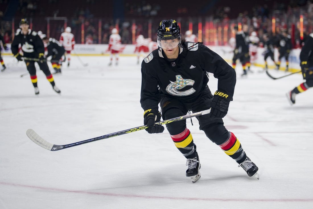 Feb 13, 2023; Vancouver, British Columbia, CAN; Vancouver Canucks defenseman Ethan Bear (74) skates during warm up prior to a game against the Detroit Red Wings at Rogers Arena. Mandatory Credit: Bob Frid-USA TODAY Sports