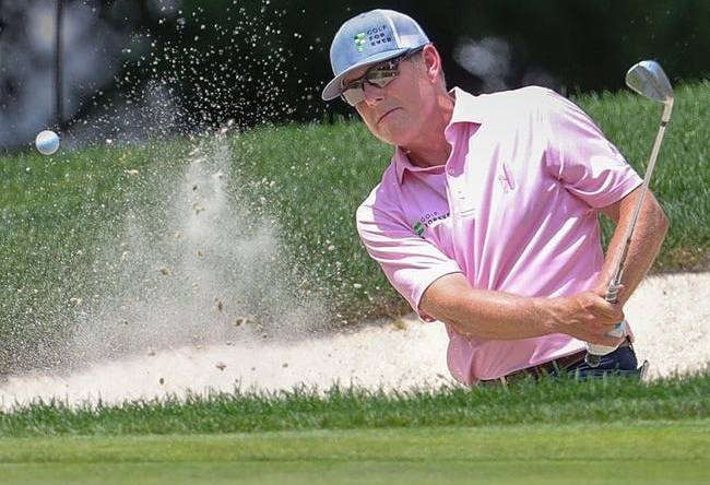 Justin Leonard chips from the number 16 bunker during first round of the Bridgestone Senior Players Championship on Thursday, July 7, 2022 in Akron, Ohio, at Firestone Country Club.

Syndication Akron Beacon Journal