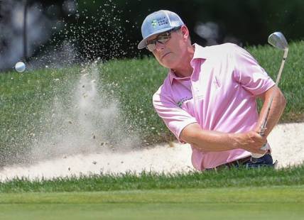 Justin Leonard chips from the number 16 bunker during first round of the Bridgestone Senior Players Championship on Thursday, July 7, 2022 in Akron, Ohio, at Firestone Country Club.

Syndication Akron Beacon Journal