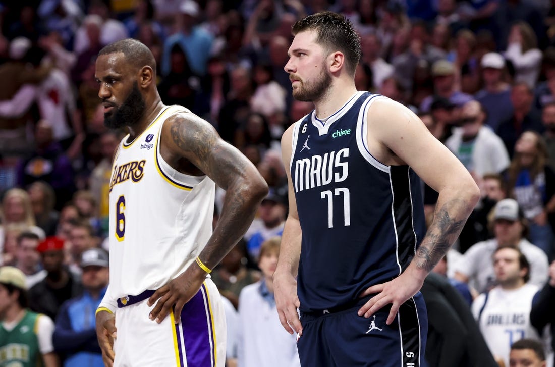 Feb 26, 2023; Dallas, Texas, USA; Los Angeles Lakers forward LeBron James (6) and Dallas Mavericks guard Luka Doncic (77) during the fourth quarter at American Airlines Center. Mandatory Credit: Kevin Jairaj-USA TODAY Sports